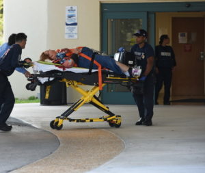 FL-FTL-HWD-SHOOTING-TA-5 : Shooting victims are taken into Broward Health Trauma Center in Fort Lauderdale after at Fort Lauderdale-Hollywood International Airport. One person may be in custody. The incident happened in Terminal 2, near the baggage claim area. A tweet from airport officials says "There is an ongoing incident in Terminal 2." No other information was immediately provided. A former White House press secretary, Ari Fleischer, has been tweeting from the airport. His initial tweet at about 1 p.m. indicated that shots had been fired and people were running.About 10 minutes later a second tweet indicated that the situation has calmed down and there was a heavy police presence. Aerial images show a group of about 100 people on a tarmac outside one of the terminals. Taimy Alvarez, Sun Sentinel ...SOUTH FLORIDA OUT; NO MAGS; NO SALES; NO INTERNET; NO TV...