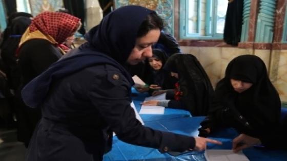 An Iranian woman prepares to cast her ballot at a polling station in Tehran on February 26, 2016. Iranians began voting across the country in elections billed by the moderate president as vital to curbing conservative dominance in parliament and speeding up domestic reforms after a nuclear deal with world powers. AFP PHOTO / ATTA KENARE / AFP / ATTA KENARE (Photo credit should read ATTA KENARE/AFP/Getty Images)